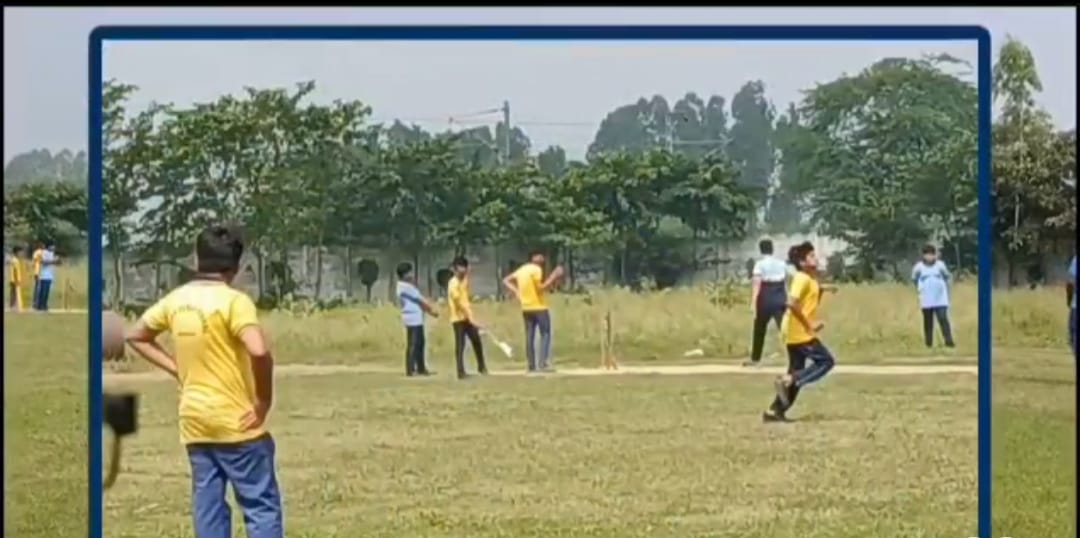 Students Playing Cricket
